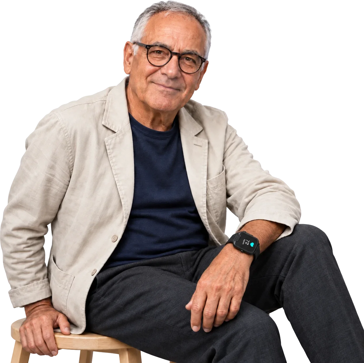 A smiling man in glasses sitting on a stool, wearing the SOS Everywhere Watch.