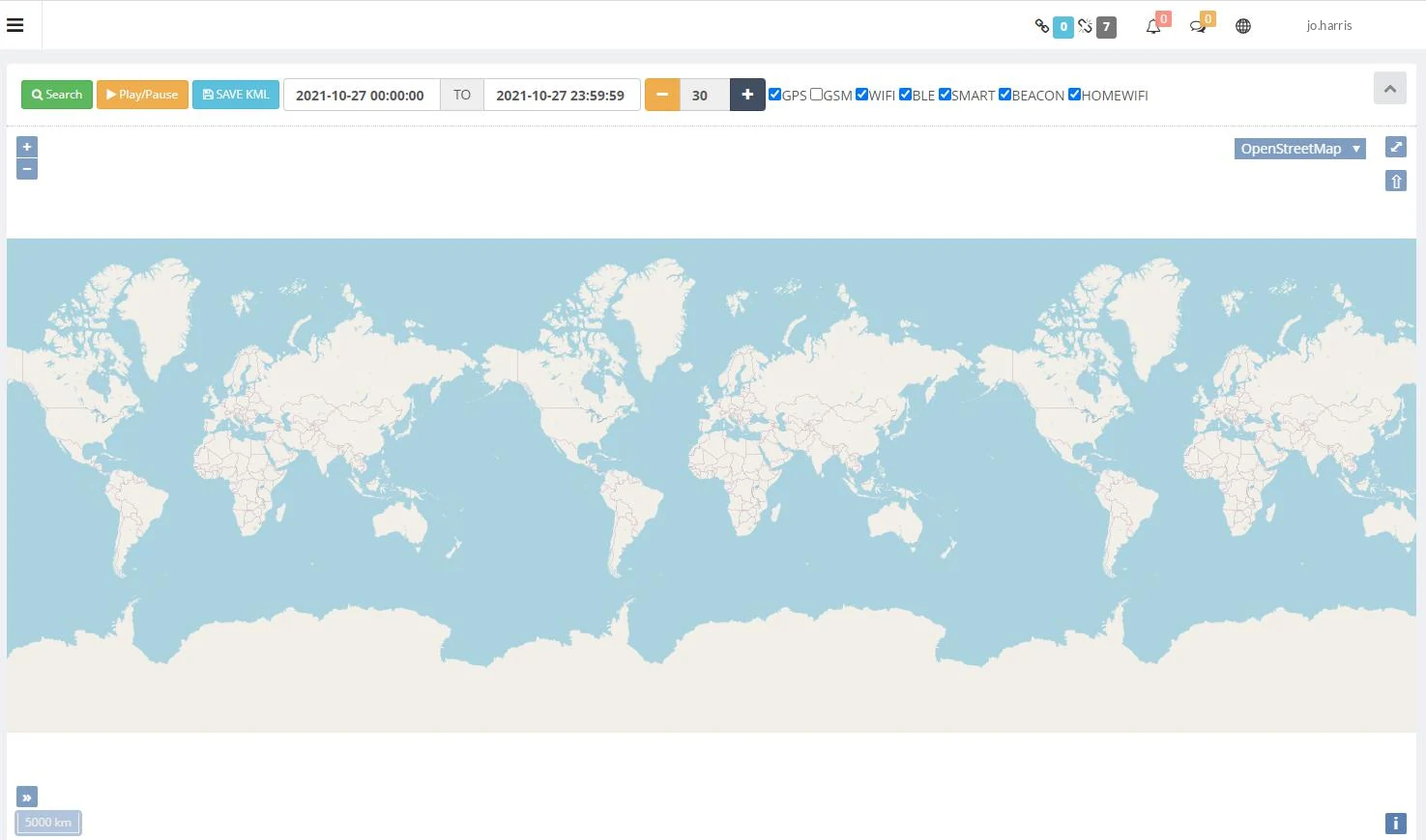 The History Tracks page on the web dashboard: a date range, Search, Play/Pause and SAVE KML buttons, a playback speed, filters by location type, and a map.